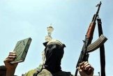 Jihadi: Koran in one hand, AK-47 in the other!
