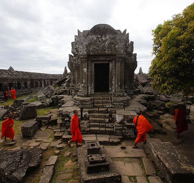 Buddhist monks visit the Preah Vihear temple on the border between Thailand and Cambodia