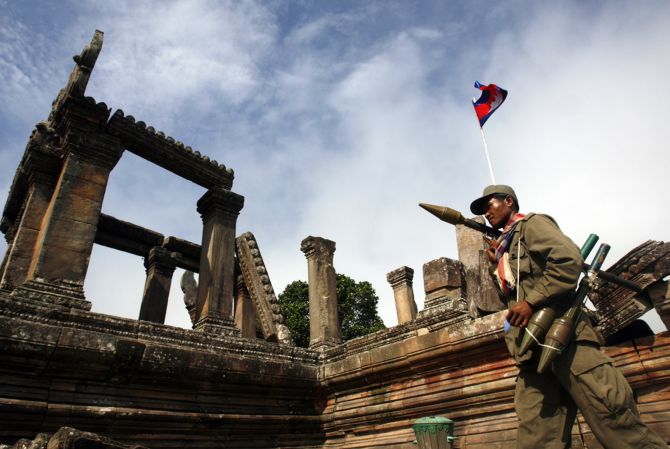 Cambodian soldier patrols at Preah Vihaer temple.