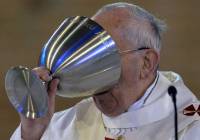 Pope Francis emptying the cup!