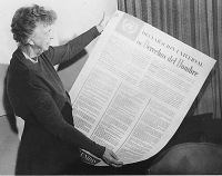 Eleanor Roosevelt with the Spanish version of the Universal Declaration of Human Rights