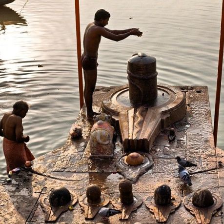 Shiva-linga puja in the Ganga.
